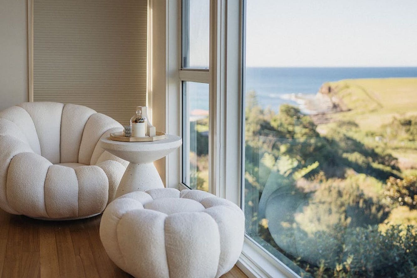 A loungeroom with a view at an Airbnb in Kiama